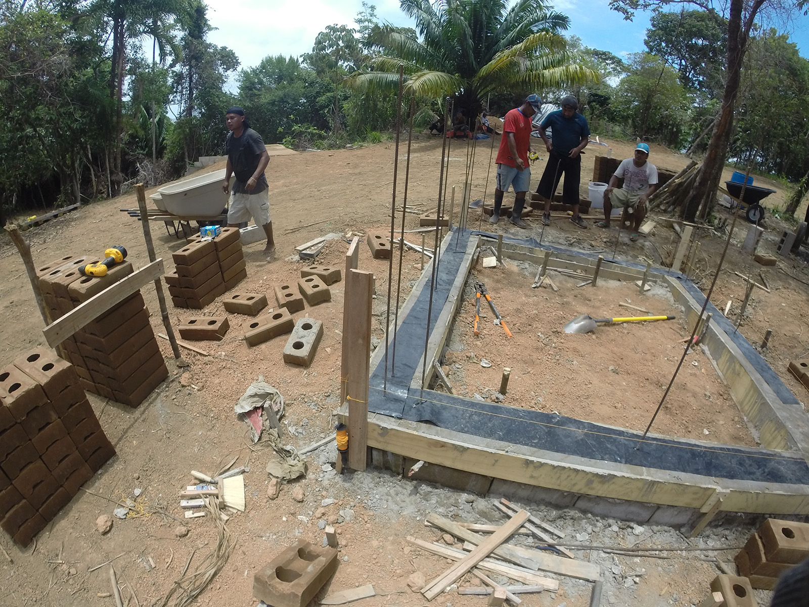 Compressed earth block building construction